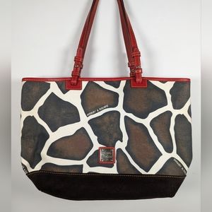 Dooney Bourke Brand New Giraffe Print Shoulder with a tote bag.